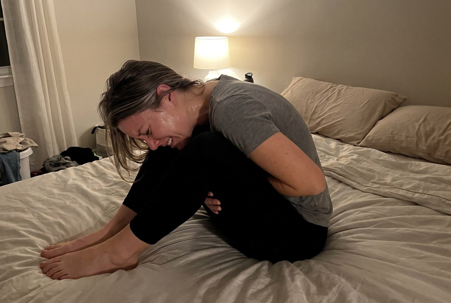 Curled up in pain at night